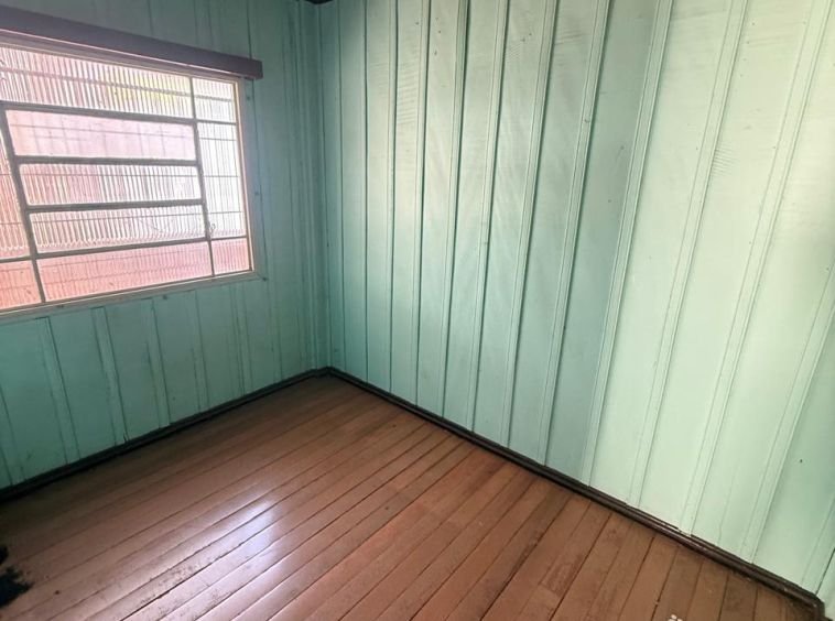 Casa em frente à Caixa Econômica