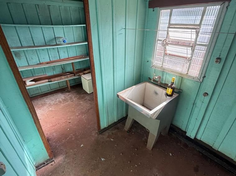 Casa em frente à Caixa Econômica