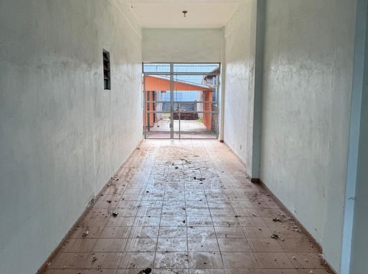 Casa em frente à Caixa Econômica